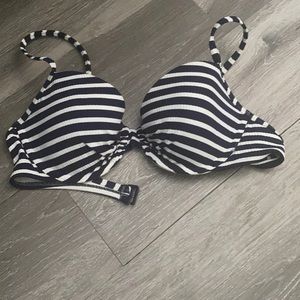Blue striped bathing suit top.